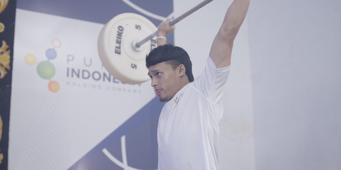 Atlet angkat besi Rizki Juniansyah yang berhasil membawa pulang medali emas di Olimpiade Paris 2024