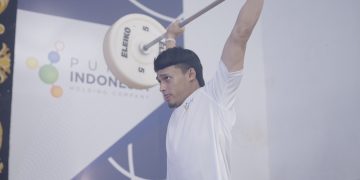 Atlet angkat besi Rizki Juniansyah yang berhasil membawa pulang medali emas di Olimpiade Paris 2024