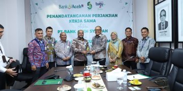 Tugu dan Bank Aceh Syariah
