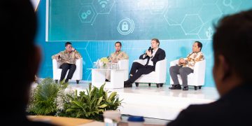Sesi panel diskusi acara Wholesale Digital Workshop 2024 bertajuk “Digital Ekonomi di Indonesia: Tren, Regulasi, dan Tantangan Keamanan Siber” di Ballroom Menara BNI Pejompongan, Jakarta, Selasa (10/12/2024).