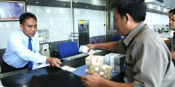 Ilustrasi penukaran uang rusak di BI