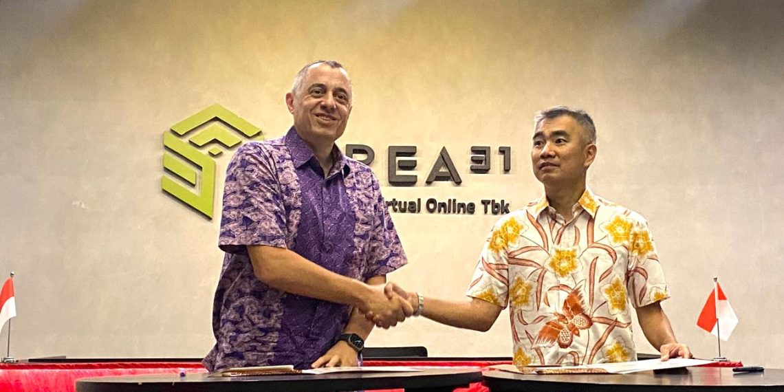 Chief Operations Officer Eutelsat OneWeb Fabio Mando dan Presiden Direktur PT Dunia Virtual Online Tbk (AREA31) Michel Alifen menandatangani kesepakatan kerja sama strategis selama 10 tahun.