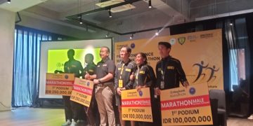 Menang Rp100 juta di Maybank Marathon 2025, Odekta Elvina Naibaho dan Robi Syianturi berbagi tips atur uang untuk atlet muda Indonesia.