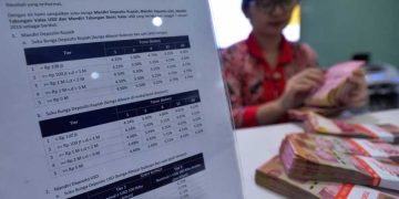 Penyebab Lambatnya Transmisi Suku Bunga Kredit usai BI Rate Dipangkas