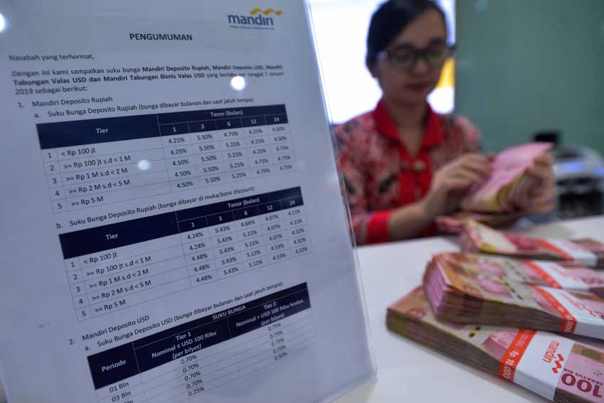 Penyebab Lambatnya Transmisi Suku Bunga Kredit usai BI Rate Dipangkas