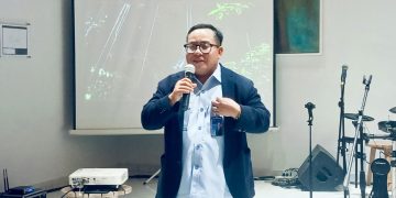 Plt. Direktur Utama PT Jamkrindo Abdul Bari saat memaparkan komitmen perseroan dalam memperkuat ekosistem pembiayaan inklusif bagi UMKM. (Foto: Ranu Arasyki Lubis)
