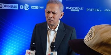 Ketua Dewan Komisioner Lembaga Penjamin Simpanan (LPS), Anggito Abimanyu selepas mengisi acara Investor Daily Roundtable & Ekonomi Syariah 2026 di Hotel Mulia Senayan, Jakarta, Rabu, 11 Februari 2026. (Foto: Yulian Saputra)