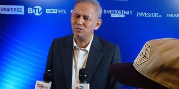 Ketua Dewan Komisioner Lembaga Penjamin Simpanan (LPS), Anggito Abimanyu selepas mengisi acara Investor Daily Roundtable & Ekonomi Syariah 2026 di Hotel Mulia Senayan, Jakarta, Rabu, 11 Februari 2026. (Foto: Yulian Saputra)