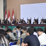 Sidang putusan KPPU dalam perkara dugaan kartel pinjol