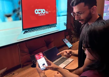 Ilustrasi transaksi nasabah pengguna platform digital bisnis, OCTO Biz