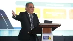 Anggota Dewan Komisioner Otoritas Jasa Keuangan (OJK) Dicky Kartikoyono dalam acara Infobank Indonesia Digital Forum 2026: Reaching the Unbanked Amidst Cyber Threats and Cost Living Crisis, di Bali Room, Hotel Indonesia Kempinski, Jakarta, Jumat, 22 Mei 2026. (Foto: Zaenal Abdurrani)