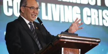 Anggota Dewan Komisioner Otoritas Jasa Keuangan (OJK) Dicky Kartikoyono dalam acara Infobank Indonesia Digital Forum 2026: Reaching the Unbanked Amidst Cyber Threats and Cost Living Crisis, di Bali Room, Hotel Indonesia Kempinski, Jakarta, Jumat, 22 Mei 2026. (Foto: Zaenal Abdurrani)